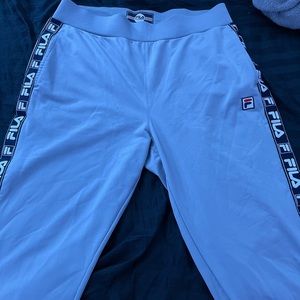 Fila track pants with logo on the sides.